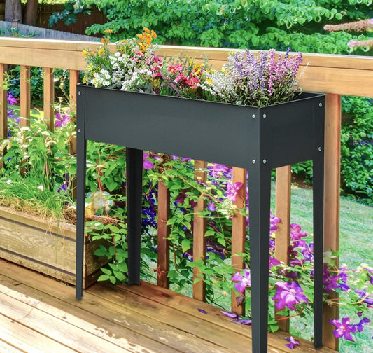 Raised metal planter box for vegetables and flowers
